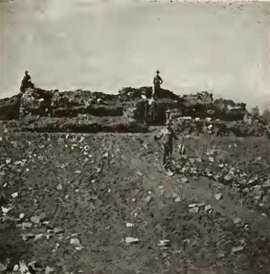 large mound partly excavated